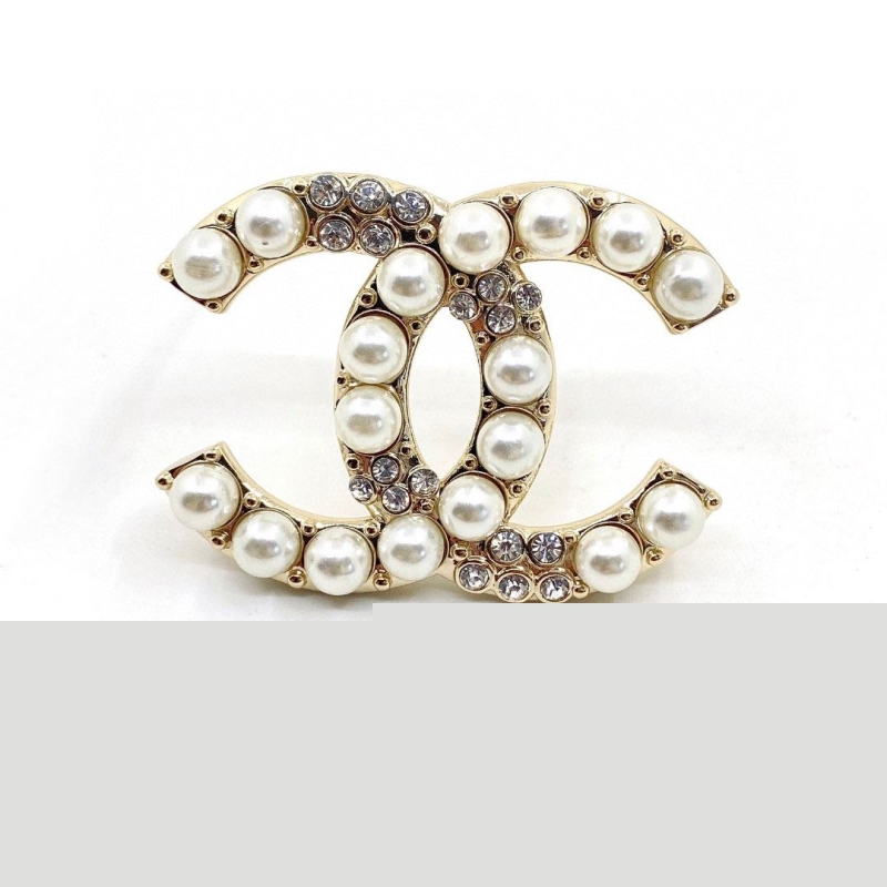 Ch*el brooches